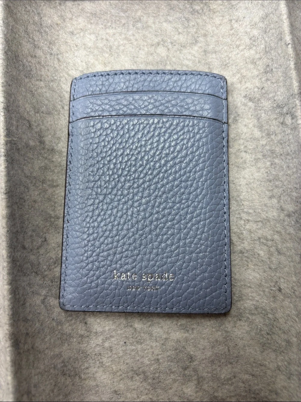 kate spade blue pebbled leather card holder with gold logo. Pre-owned
